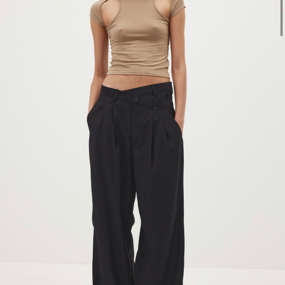 Low-rise criss cross trousers from Source Unknown